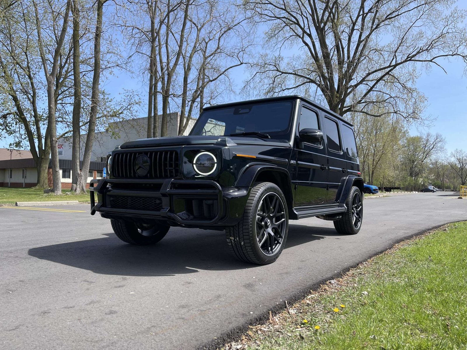 Ceramic-Coating-Mercedes-G-Wagon-Green Mercedes-AMG G-Wagon after ceramic coating with sun reflecting off the hood