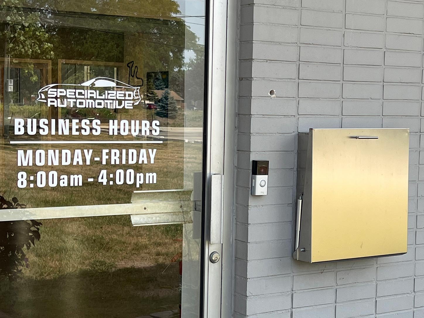 Secure entrance with alarm system, video doorbell and key box
